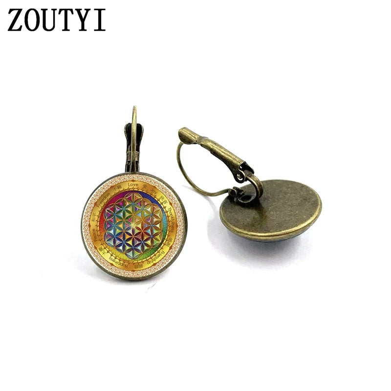 Photo of the new/glamour fashion life flower pattern, convex glass inlay earrings, feminine decoration.