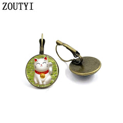 New/glamour fashion beckoning cat photo pattern, convex glass inlay earrings, feminine decoration.