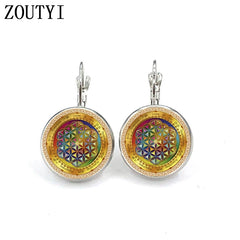 Photo of the new/glamour fashion life flower pattern, convex glass inlay earrings, feminine decoration.